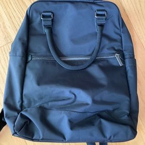 Travel backpack with handles